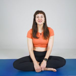 Reformer pilates machine in use in a studio